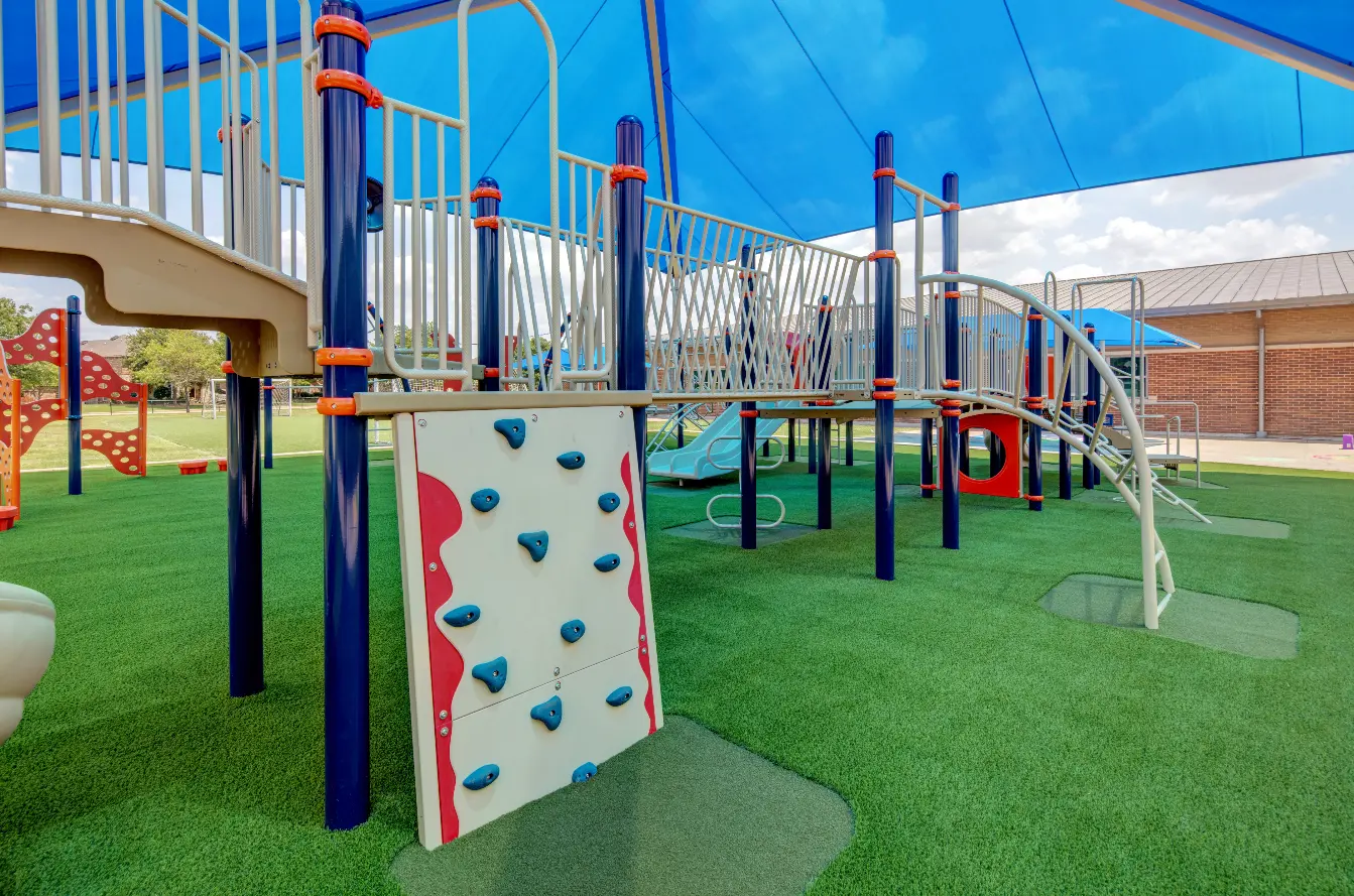 school playground on artificial grass lawn